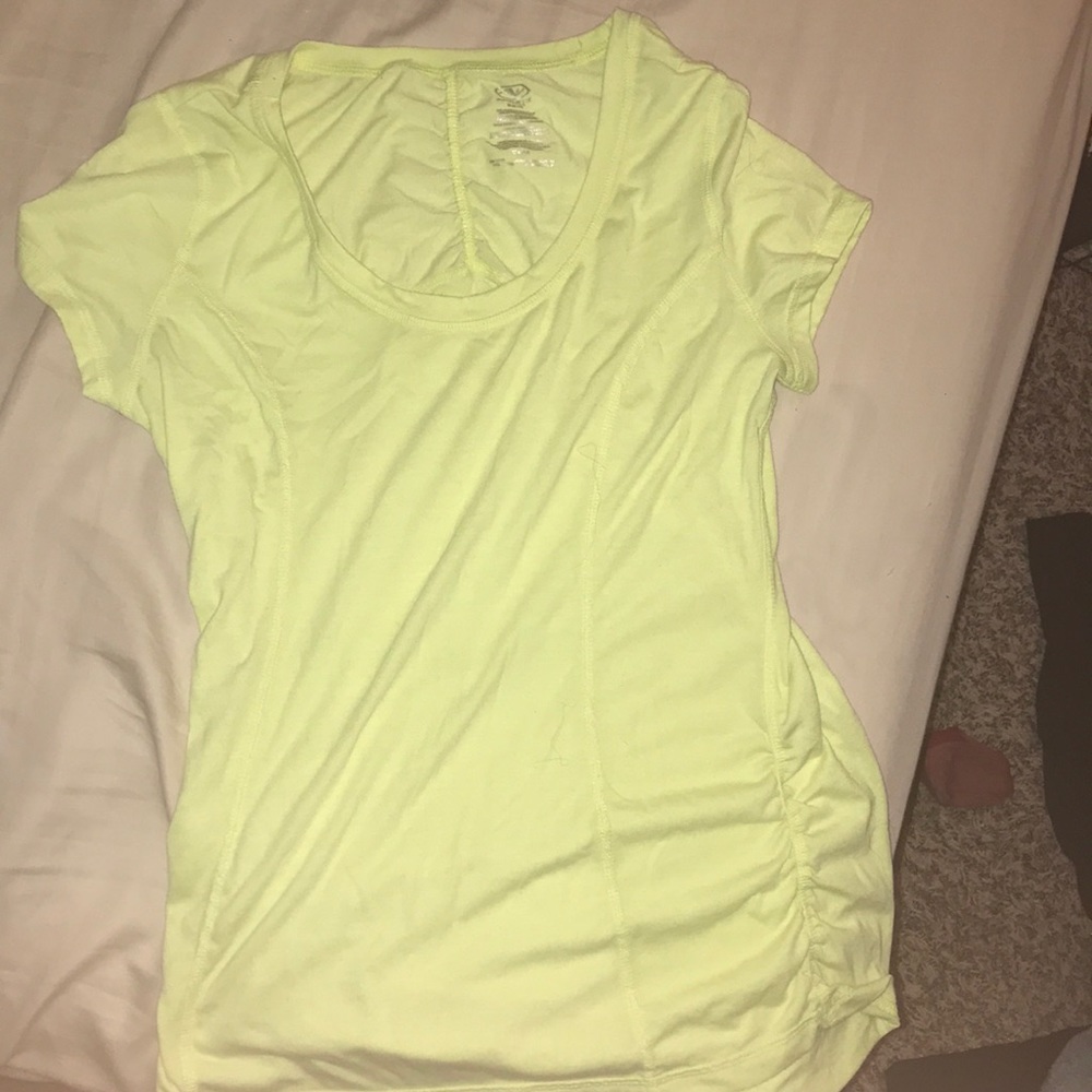 Yellow work out shirt.